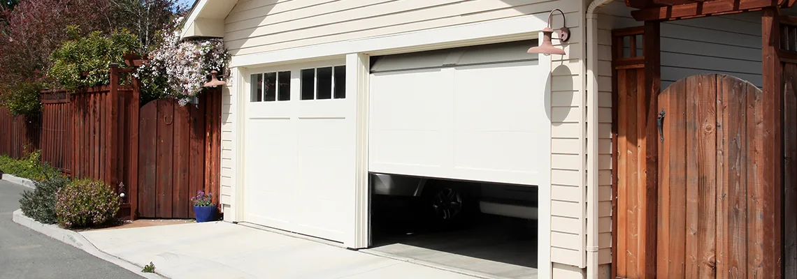 Fix Metal Garage Door Jerking in Pekin, Illinois